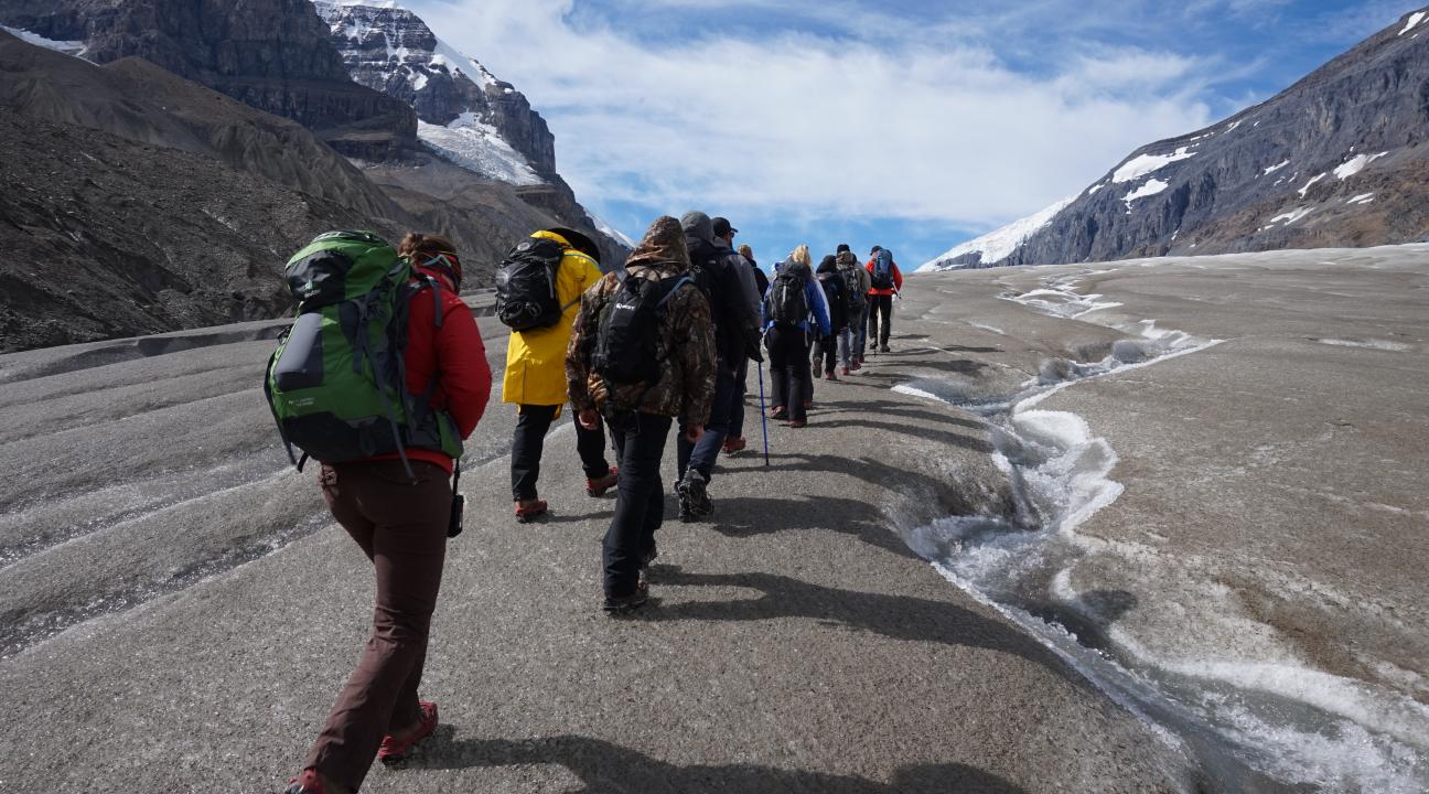 Class hiking on glacier