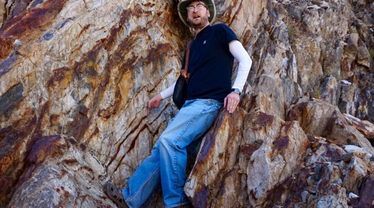 Matty standing on an outcrop