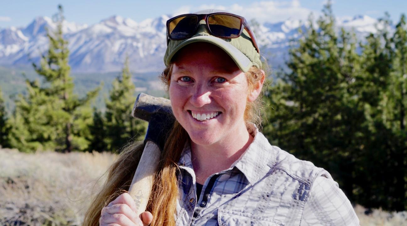 Woman holding a sledge hammer