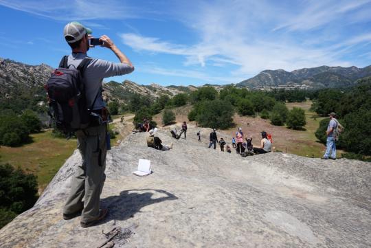 Owen taking a photo of the students