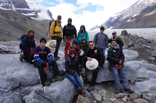 Class posing for photo on Athabasca glacier