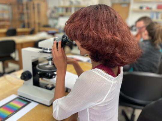 Student using scope