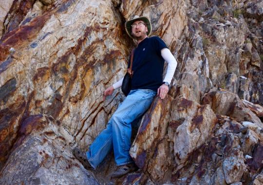 Matty standing on an outcrop