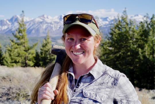 Woman holding a sledge hammer